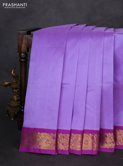 Silk cotton saree lavender and purple with plain body and zari woven korvai border