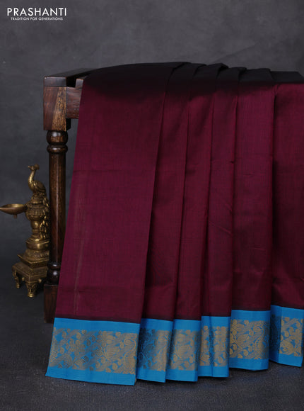 Silk cotton saree deep wine shade and cs blue with plain body and zari woven korvai border