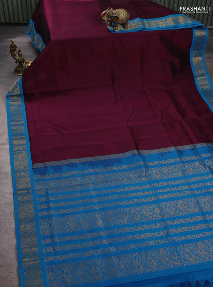 Silk cotton saree deep wine shade and cs blue with plain body and zari woven korvai border