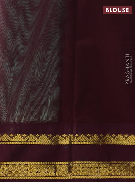 Silk cotton saree teal green and coffee brown with plain body and rettapet zari woven korvai border
