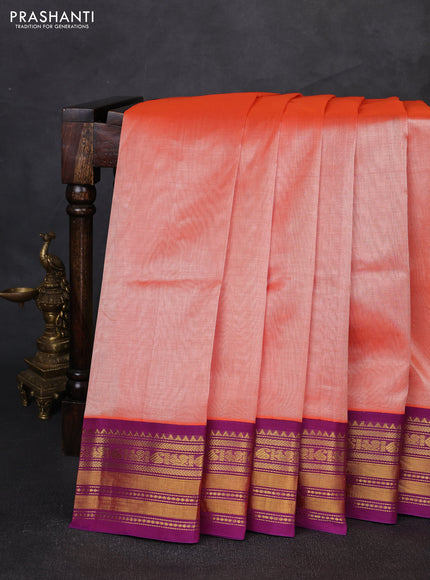 Silk cotton saree orange and purple with plain body and temple zari woven korvai border