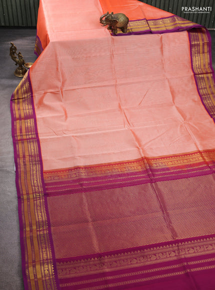 Silk cotton saree orange and purple with plain body and temple zari woven korvai border