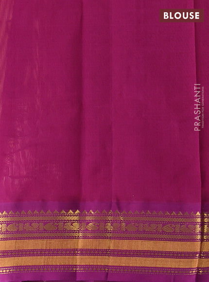 Silk cotton saree orange and purple with plain body and temple zari woven korvai border
