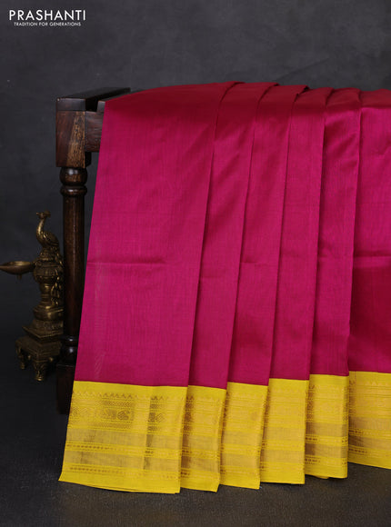 Silk cotton saree pink and yellow with plain body and temple zari woven korvai border
