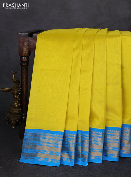 Silk cotton saree lime yellow and cs blue with plain body and temple zari woven korvai border
