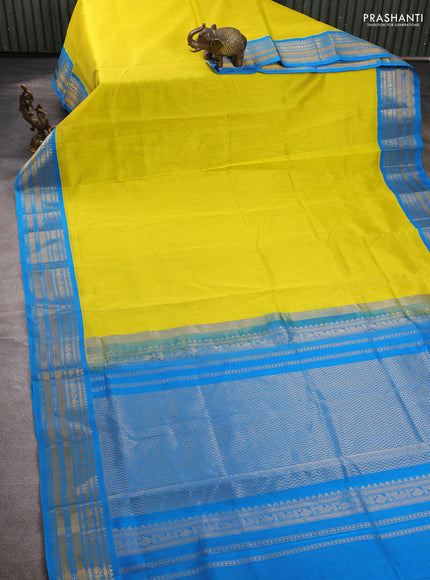 Silk cotton saree lime yellow and cs blue with plain body and temple zari woven korvai border