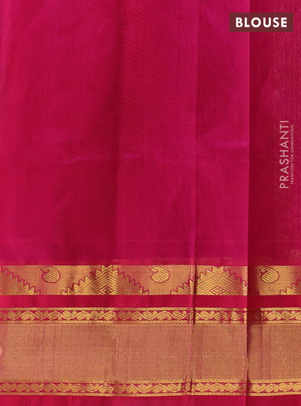 Silk cotton saree bottle green and pink with allover checked pattern and temple zari woven korvai border