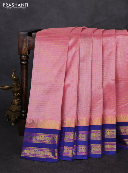 Silk cotton saree pastel pink and blue with allover small zari ckecked pattern and temple rettapet zari woven korvai border