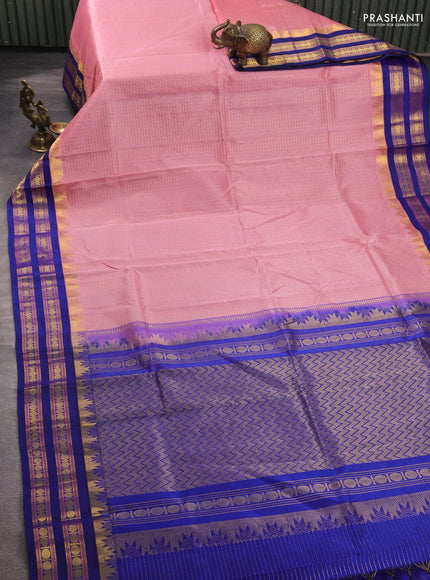 Silk cotton saree pastel pink and blue with allover small zari ckecked pattern and temple rettapet zari woven korvai border