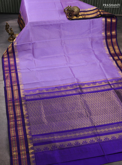 Silk cotton saree lavender and blue with allover small zari ckecked pattern and temple rettapet zari woven korvai border