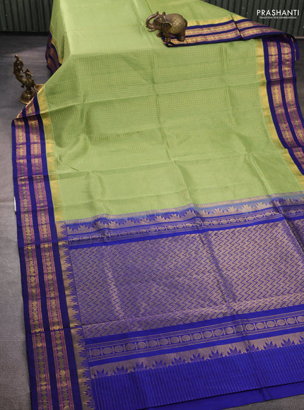 Silk cotton saree pista green and blue with allover small zari ckecked pattern and temple rettapet zari woven korvai border