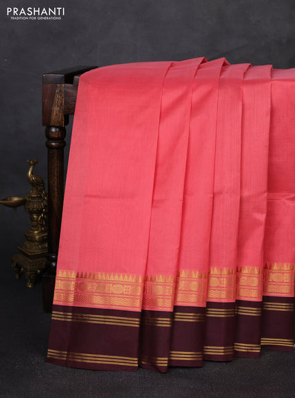 Silk cotton saree peach pink and coffee brown with plain body and temple rettapet zari woven korvai border