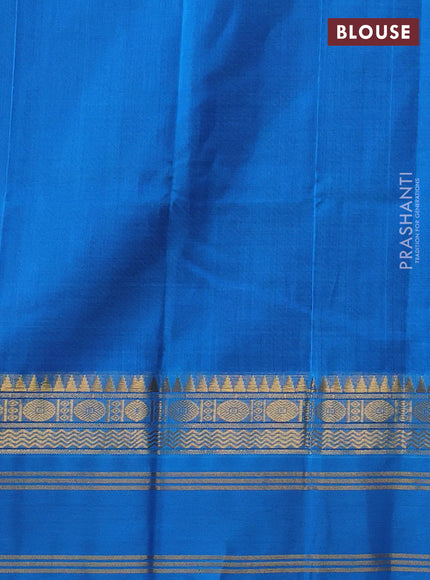Silk cotton saree violet and cs blue with plain body and temple rettapet zari woven korvai border