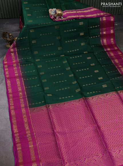 Pure soft silk saree bottle green and pink with allover zari woevn buttas and zari woven border