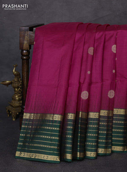 Pure soft silk saree dark pink and bottle green with allover zari woven buttas and zari woven border
