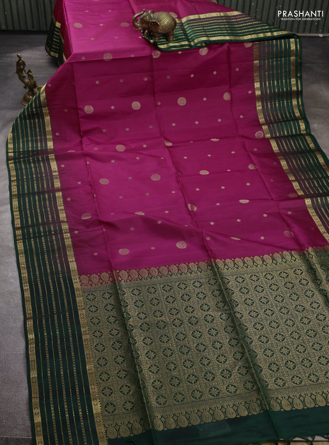 Pure soft silk saree dark pink and bottle green with allover zari woven buttas and zari woven border