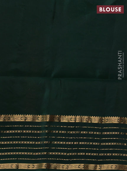 Pure soft silk saree rust shade and bottle green with allover zari woven buttas and zari woven border