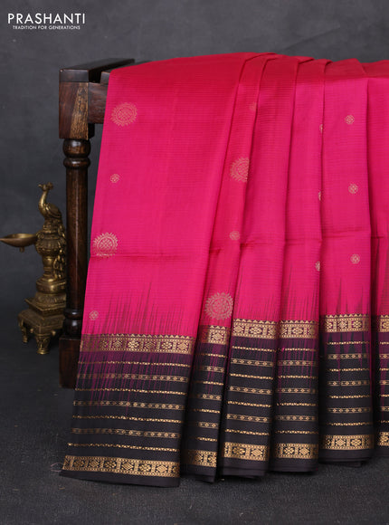 Pure soft silk saree dark pink and black with allover zari woven buttas and zari woven border
