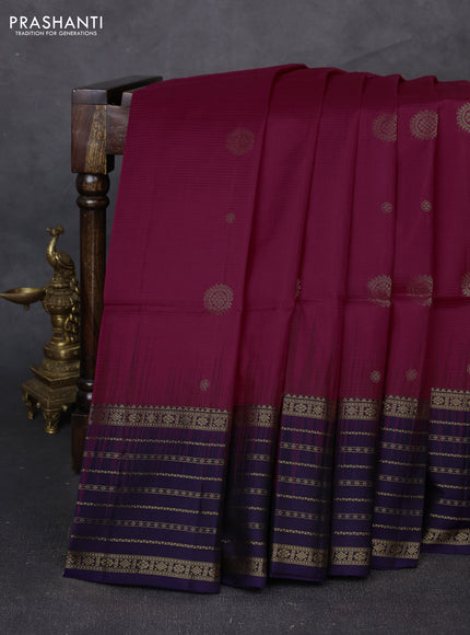 Pure soft silk saree dark pink and violet with allover zari woven buttas and zari woven border