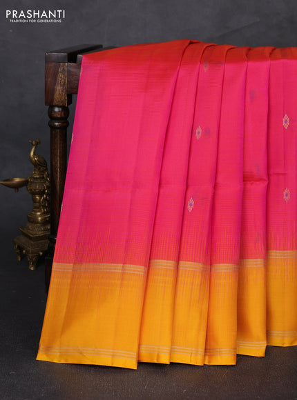 Pure soft silk saree dual shade of pinkish orange and mustard yellow with allover zari woven buttas and rettapet zari woven border