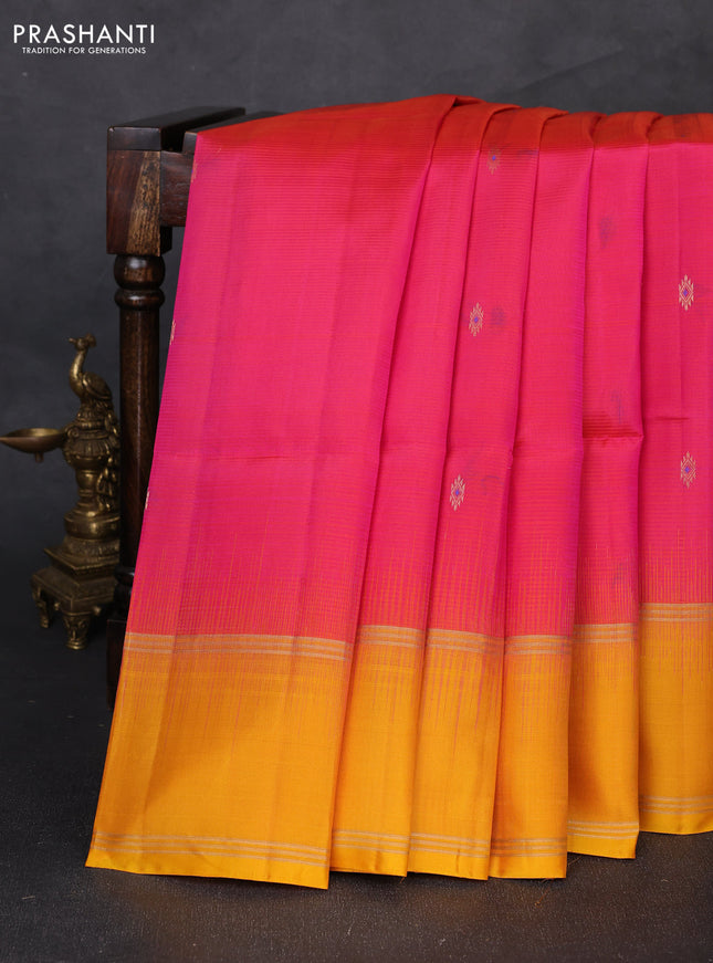 Pure soft silk saree dual shade of pinkish orange and mustard yellow with allover zari woven buttas and rettapet zari woven border