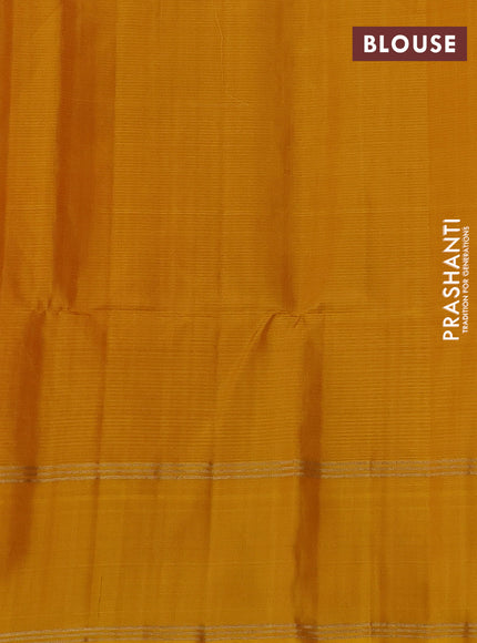 Pure soft silk saree dual shade of pinkish orange and mustard yellow with allover zari woven buttas and rettapet zari woven border