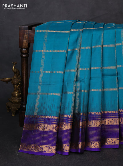 Pure soft silk saree peacock green and violet with allover zari checked pattern and zari woven border