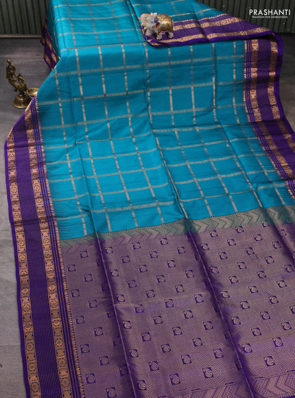 Pure soft silk saree peacock green and violet with allover zari checked pattern and zari woven border