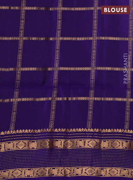 Pure soft silk saree peacock green and violet with allover zari checked pattern and zari woven border