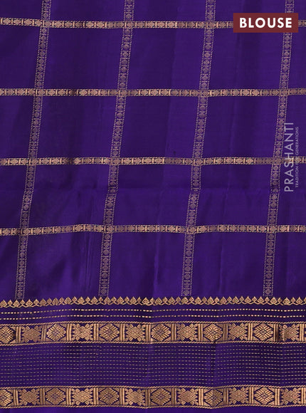 Pure soft silk saree light green and violet with allover zari checked pattern and zari woven border