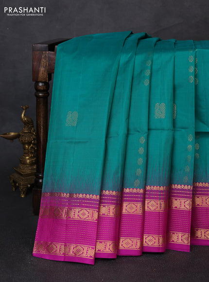 Pure soft silk saree teal green and magenta pink with allover zari woven buttas and zari woven border