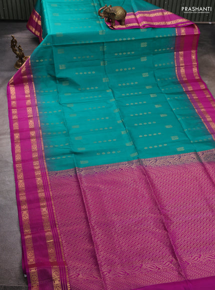 Pure soft silk saree teal green and magenta pink with allover zari woven buttas and zari woven border