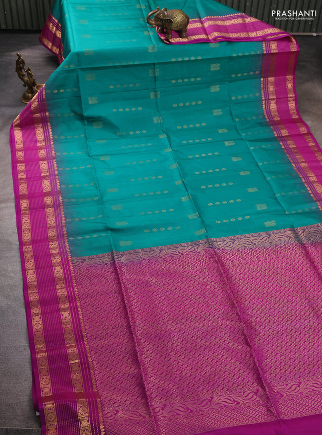 Pure soft silk saree teal green and magenta pink with allover zari woven buttas and zari woven border