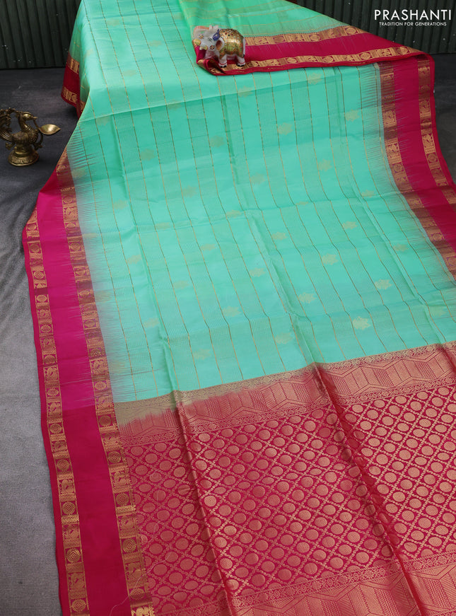 Pure soft silk saree teal green and pink with allover zari weaves & buttas and rettapet zari woven border