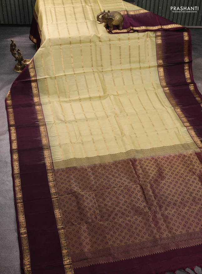 Pure soft silk saree mild pista green and deep wine with allover zari weaves pattern and long rettapet zari woven border