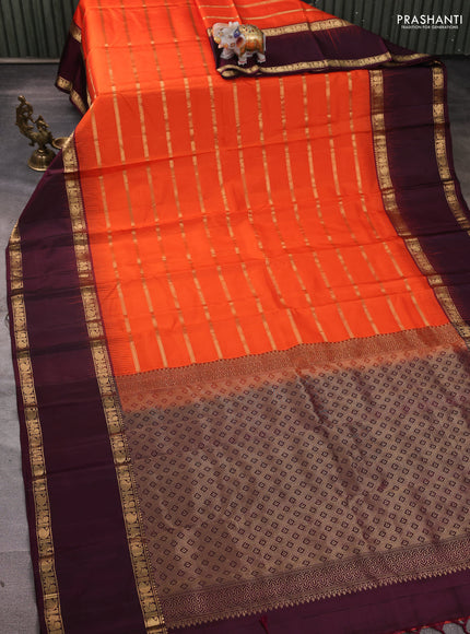 Pure soft silk saree orange and deep wine with allover zari weaves pattern and long rettapet zari woven border