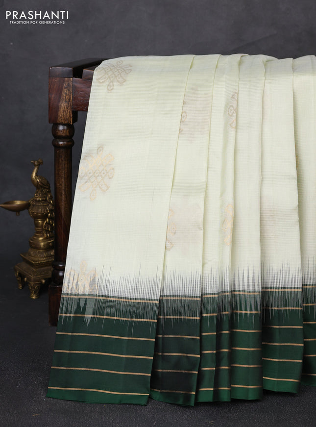 Pure soft silk saree off white and bottle green with zari woven buttas and zari woven border