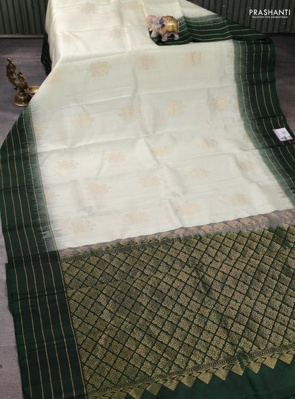 Pure soft silk saree off white and bottle green with zari woven buttas and zari woven border