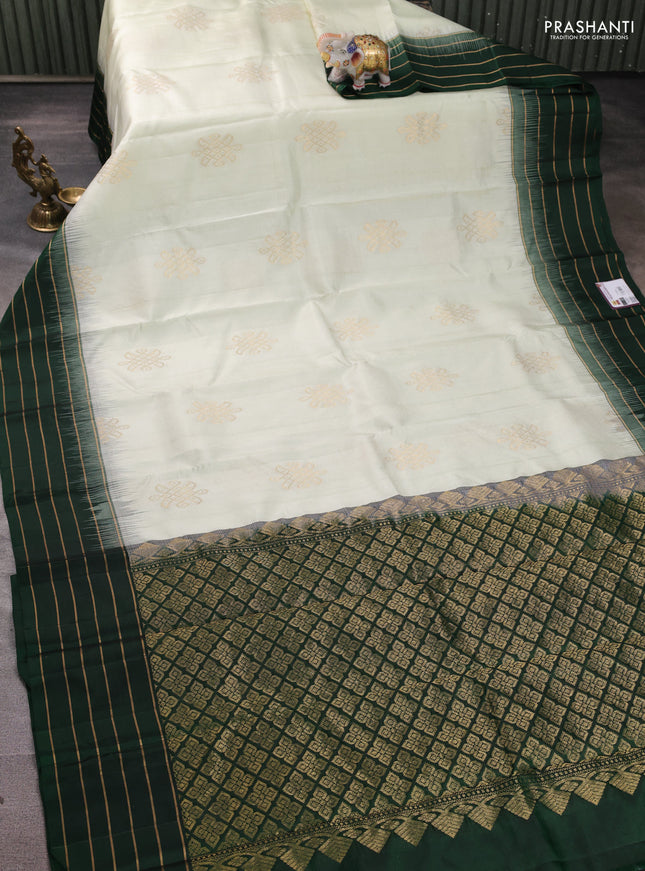 Pure soft silk saree off white and bottle green with zari woven buttas and zari woven border