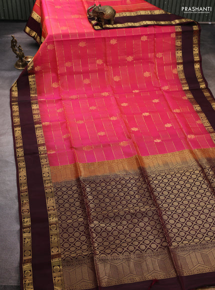 Pure soft silk saree dual shade of pinkish orange and deep maroon with allover zari weaves & buttas and rettapet zari woven border