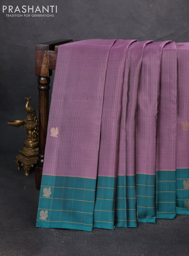 Pure soft silk saree pastel purple and teal green with allover zari weaves and silver zari woven checked border