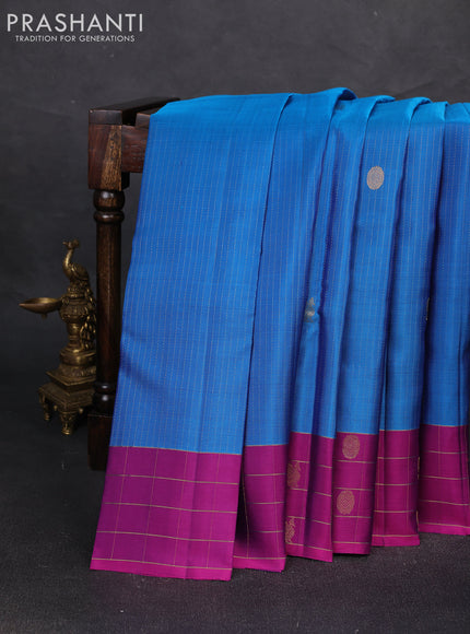 Pure soft silk saree cs blue and purple with allover zari weaves and zari woven checked border