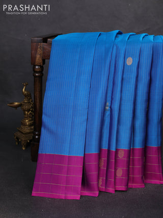 Pure soft silk saree cs blue and purple with allover zari weaves and zari woven checked border