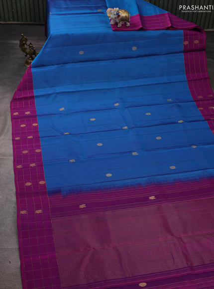 Pure soft silk saree cs blue and purple with allover zari weaves and zari woven checked border