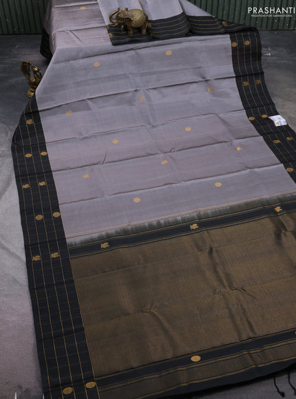 Pure soft silk saree grey and black with allover zari weaves and zari woven checked border