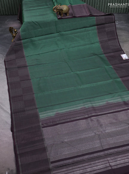 Pure soft silk saree bottle green and wine shade with allover zari weaves and zari woven checked border
