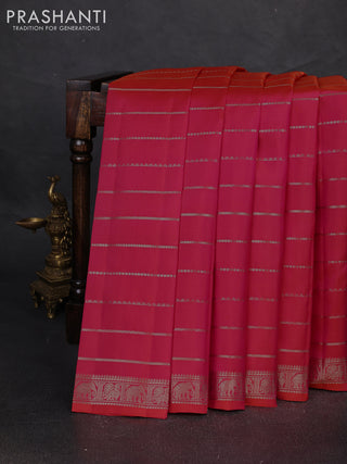 Pure soft silk saree dual shade of pinkish orange with allover zari weaves and zari woven border