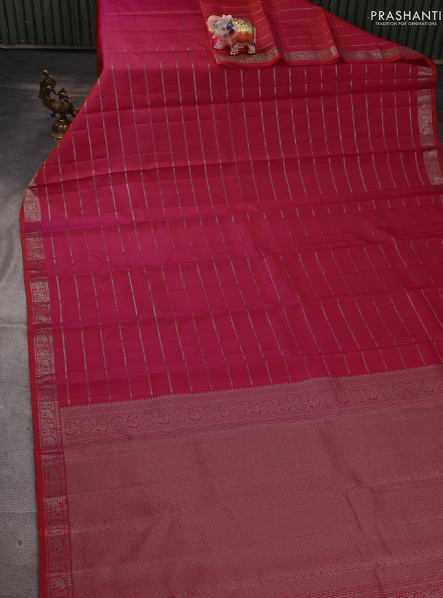 Pure soft silk saree dual shade of pinkish orange with allover zari weaves and zari woven border