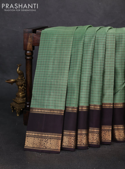 Pure soft silk saree pastel green and deep wine with allover zari woven checked pattern and rettapet zari woven border