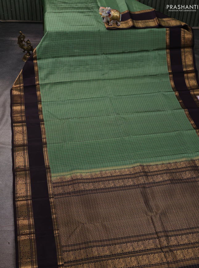 Pure soft silk saree pastel green and deep wine with allover zari woven checked pattern and rettapet zari woven border